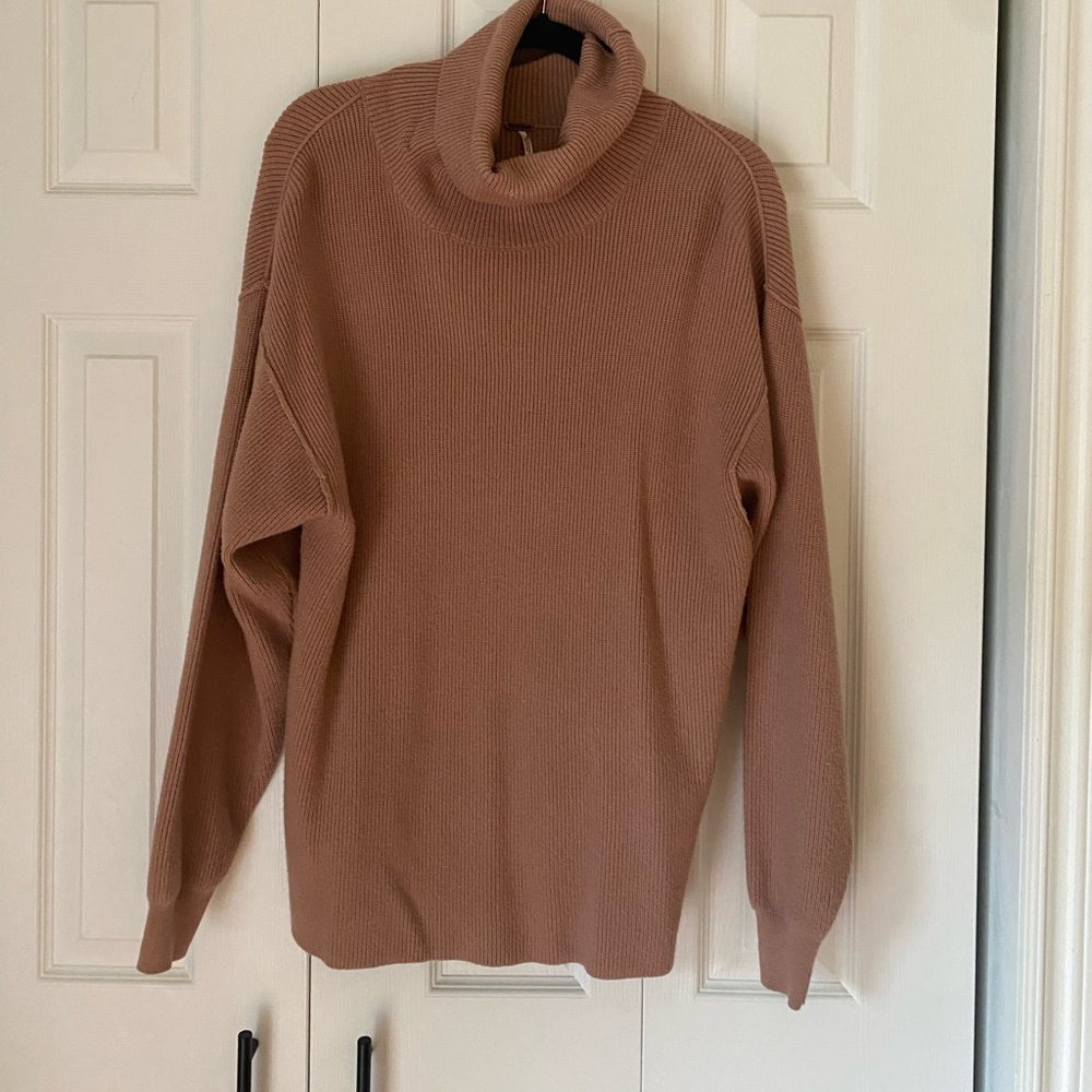 free people turtle neck tunic.